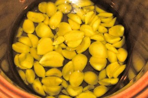 Garlic Cloves Poaching in Olive Oil